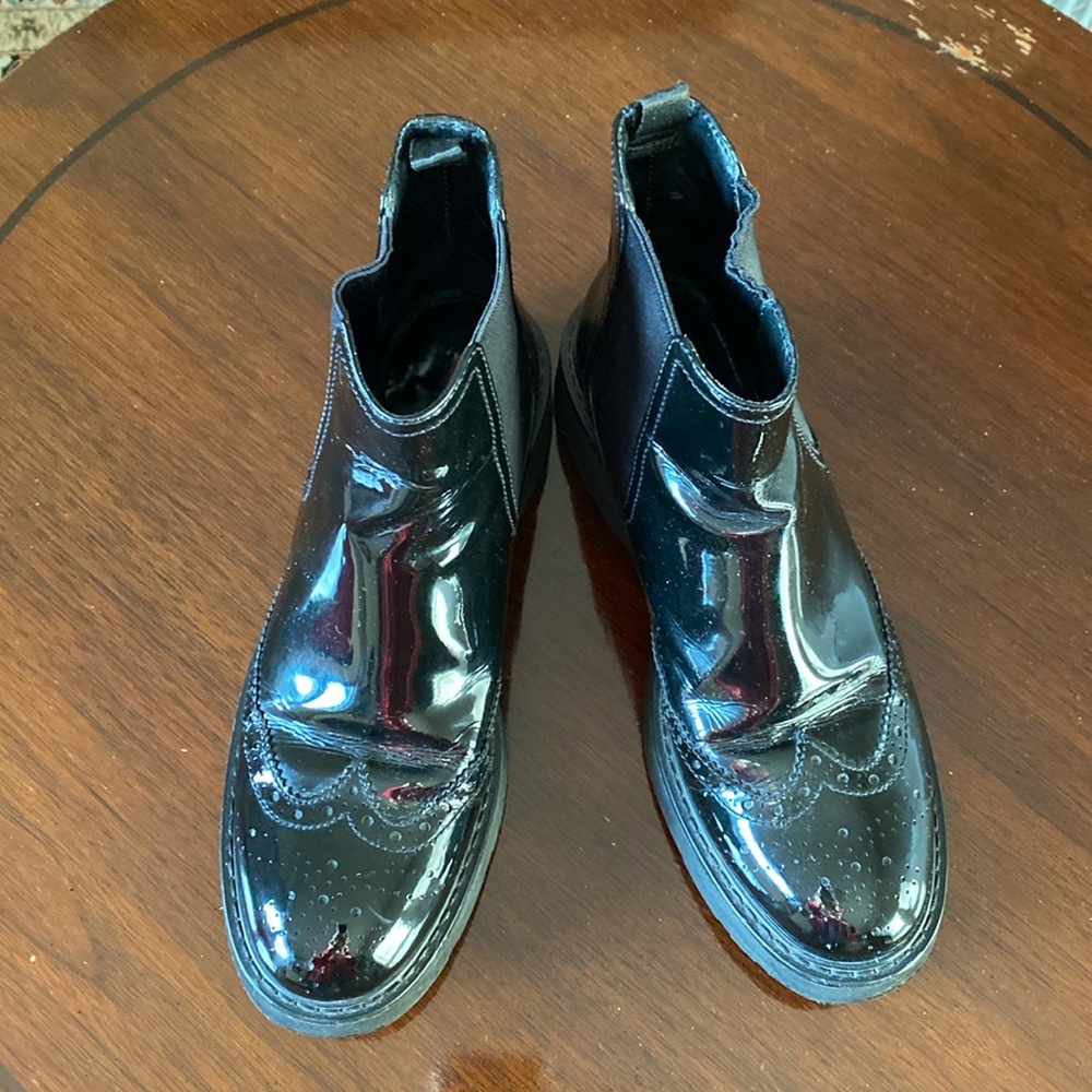 PRADA BLACK LEATHER BOOTS. Size 38 .